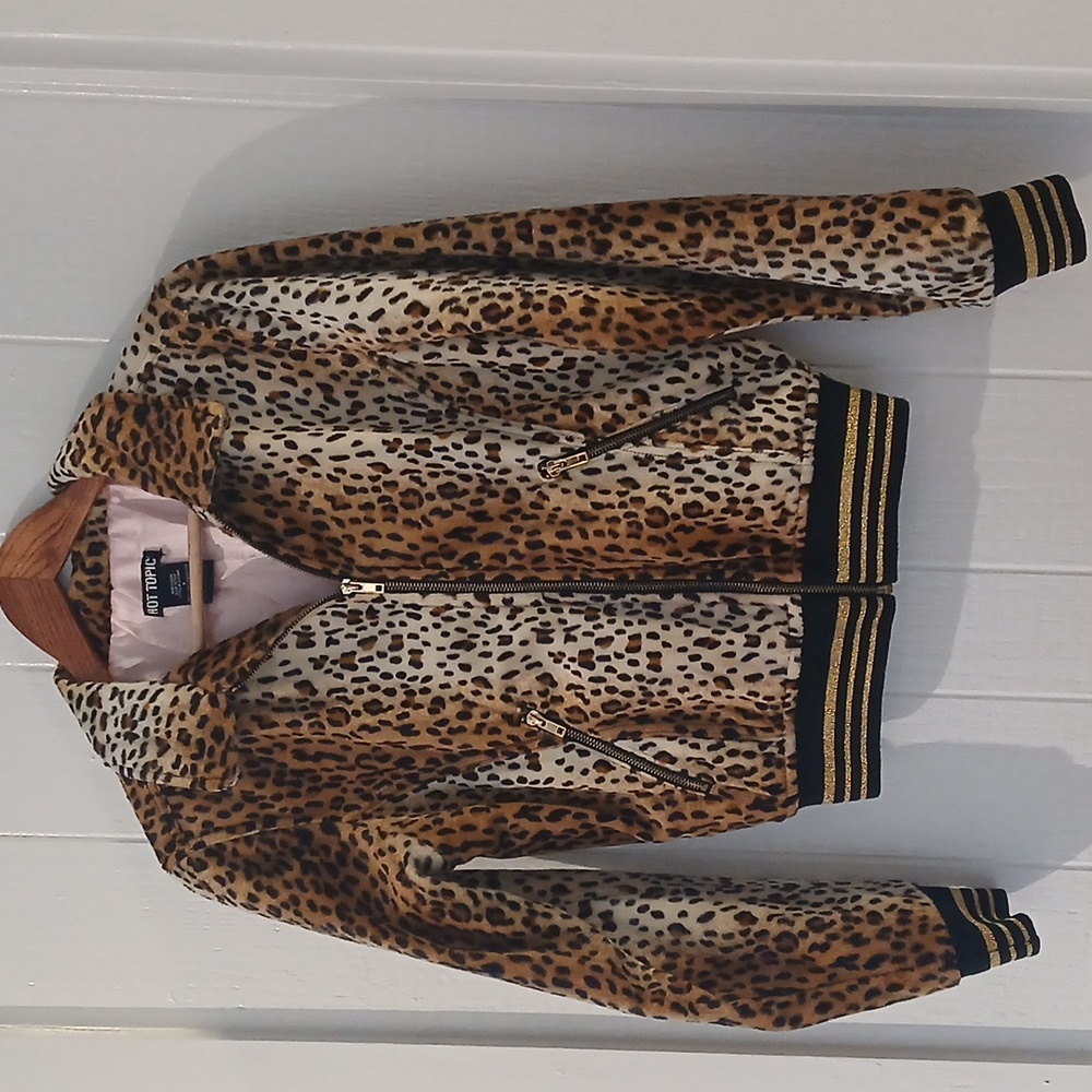 Size small, leopard print bomber jacket w/black & gold elastic cuff detailing